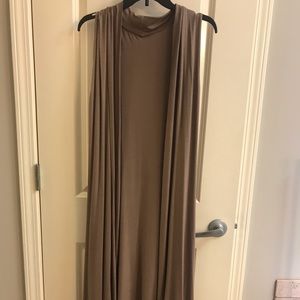 Long sleeveless cardigan.